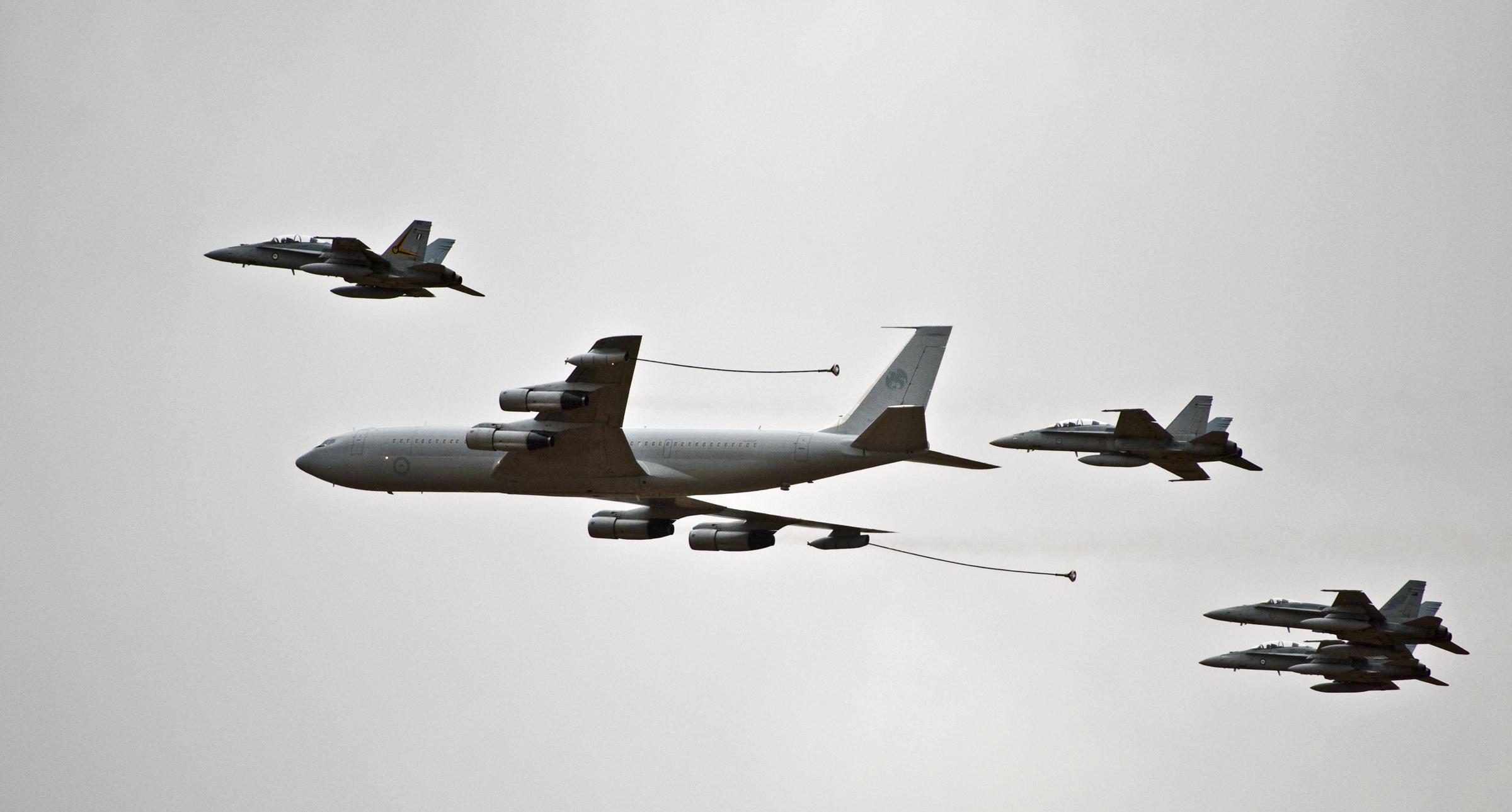 RAAF B707 tanker refuelling F18's