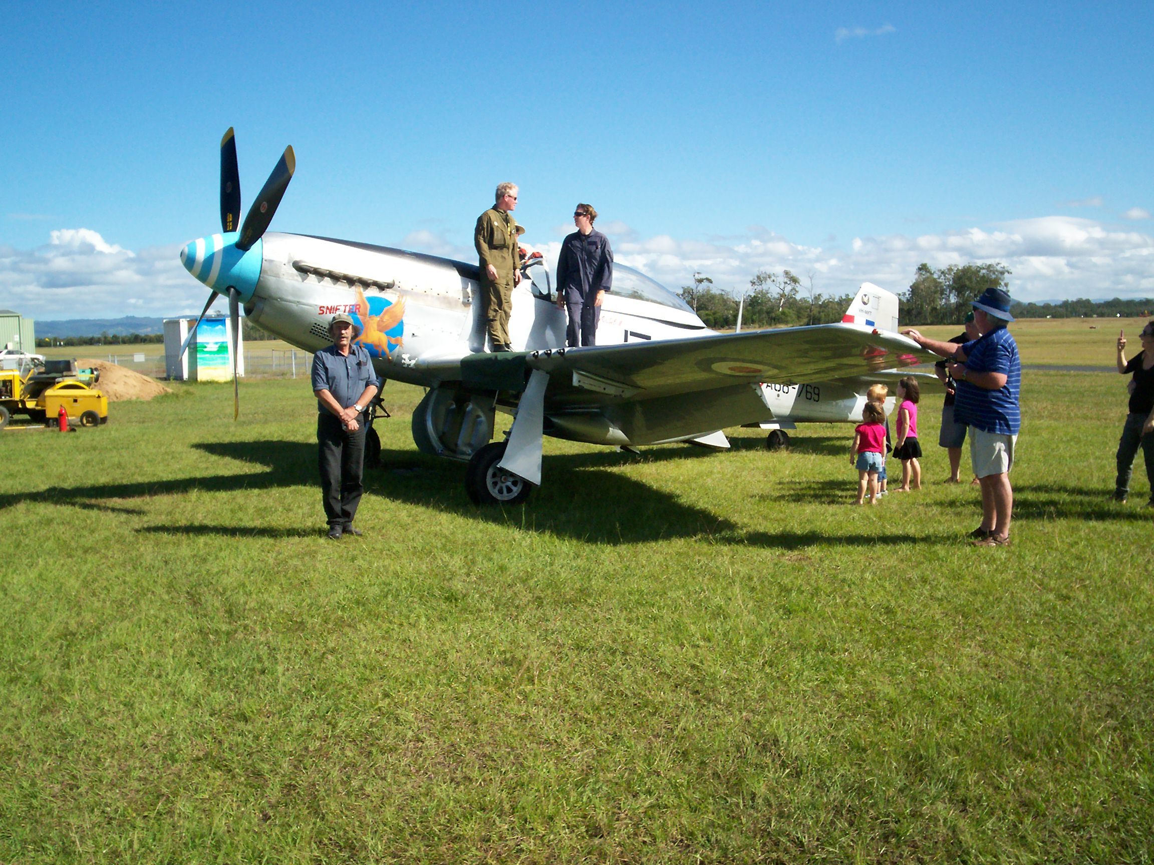 Pilot with aircraft at Caboolture